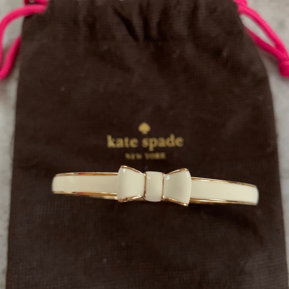 White/ivory Kate Spade bangle.